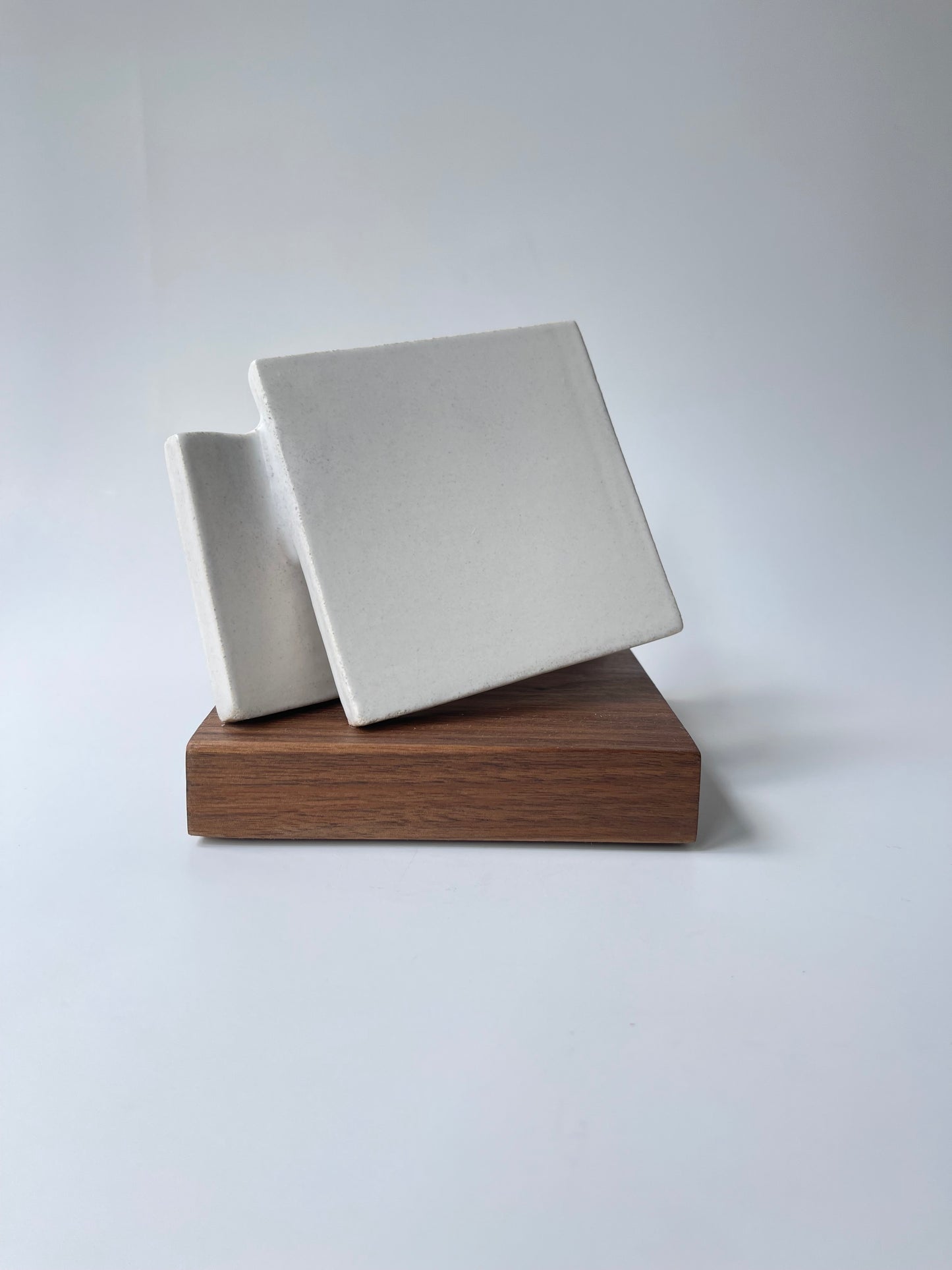 Intersecting Squares on walnut base