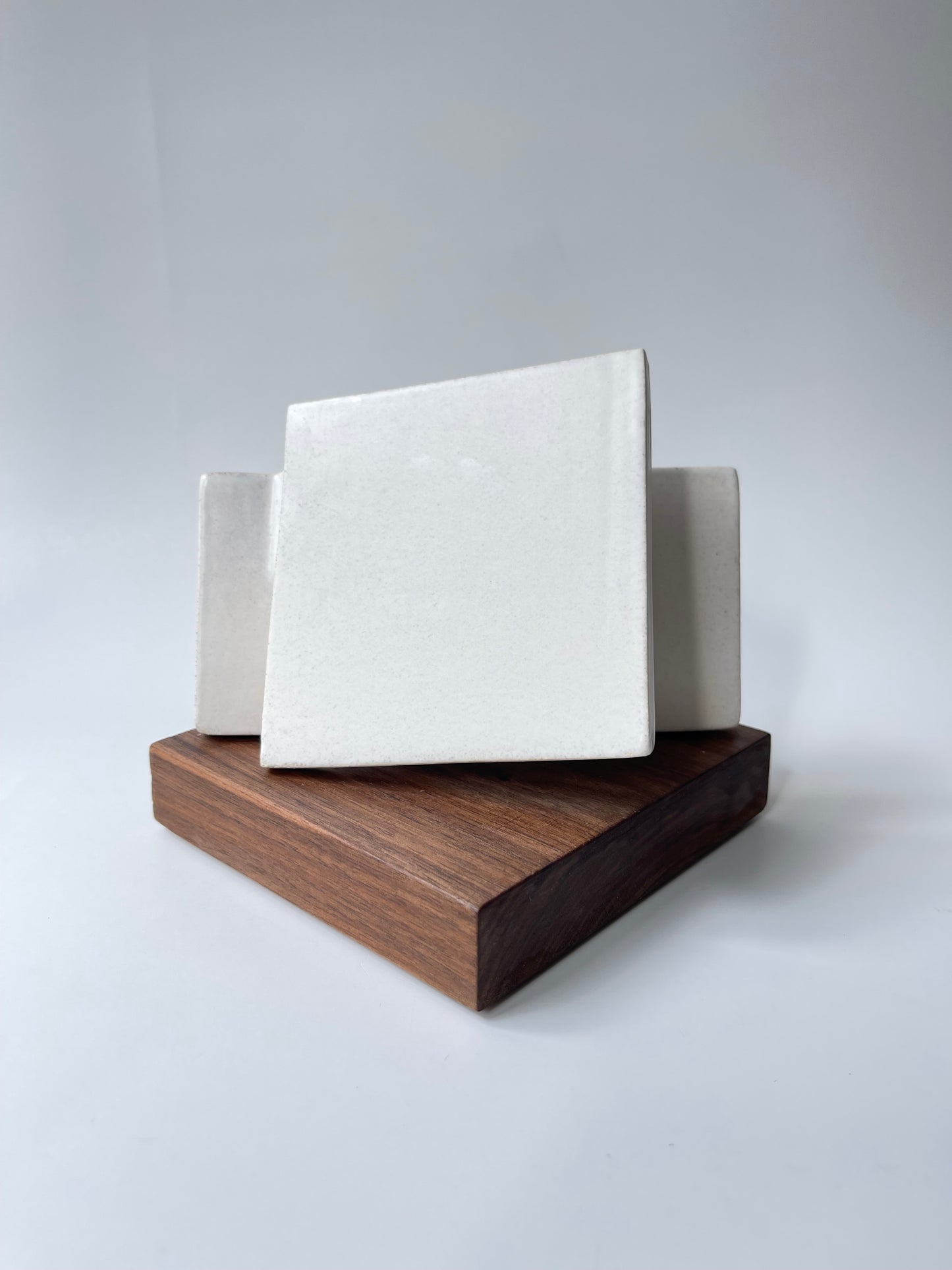 Intersecting Squares on walnut base